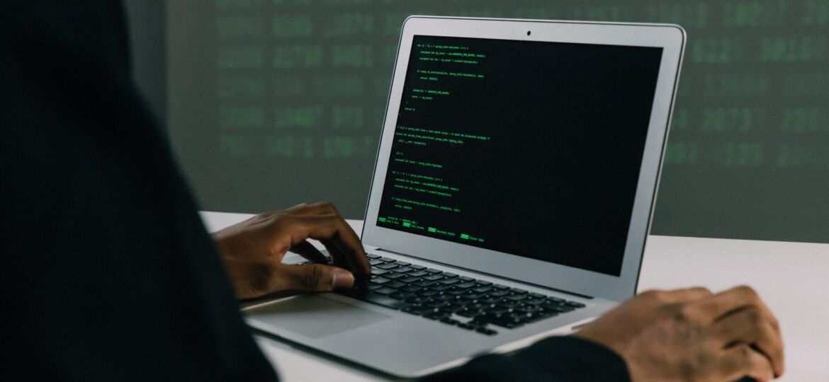 Free Person Using Macbook Air Stock Photo