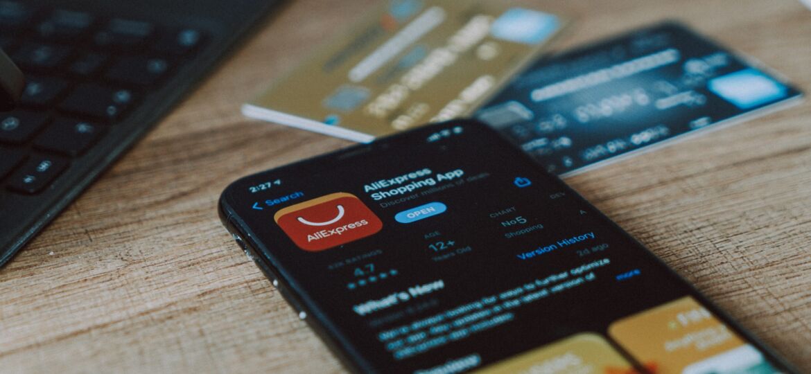black and orange card on brown wooden table