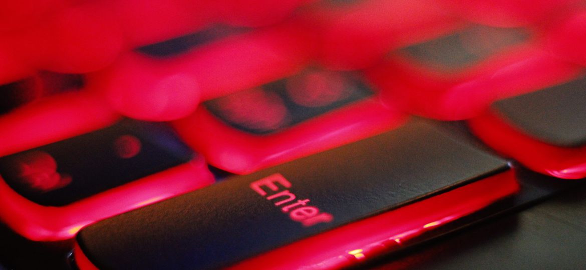 a close up of a red and black keyboard