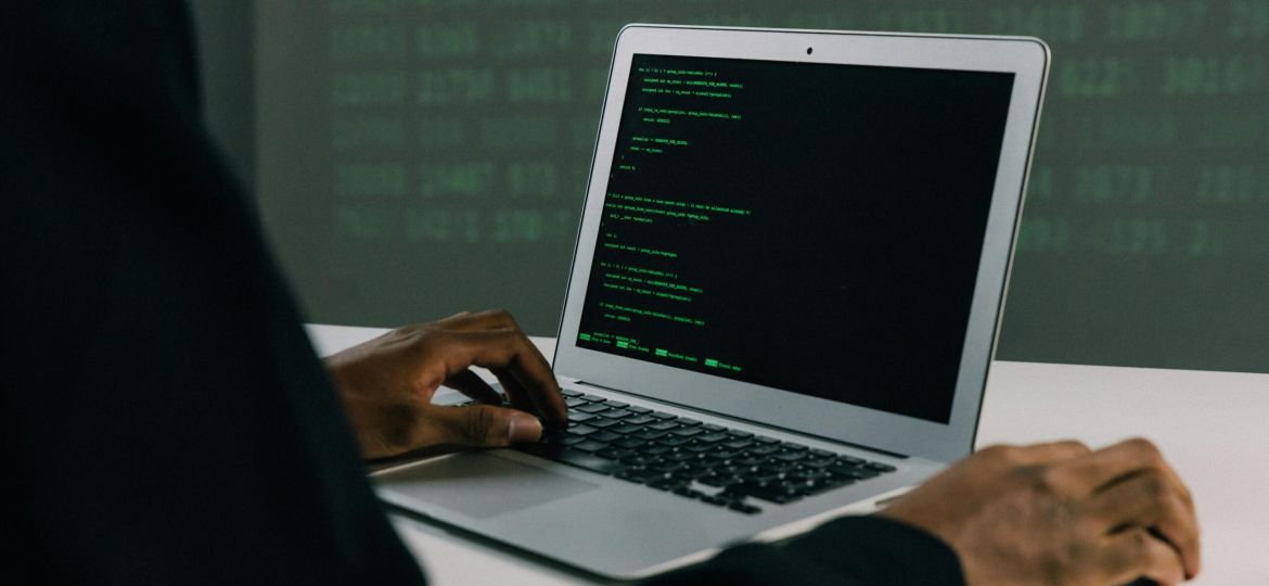 Free Person Using Macbook Air Stock Photo