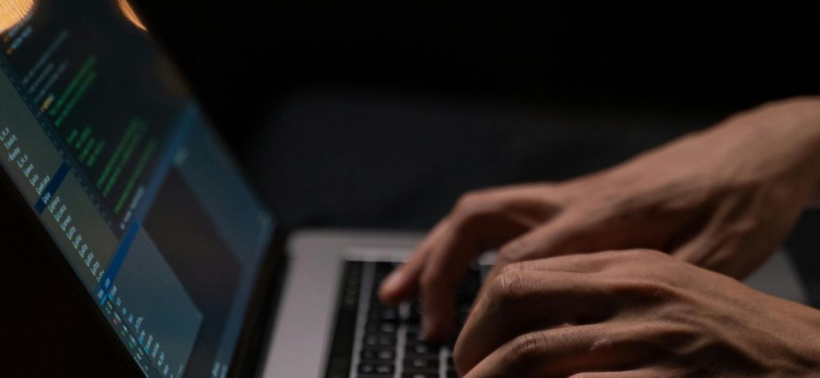 person-using-silver-and-black-laptop-computer