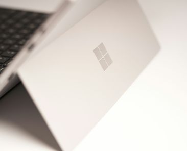 white-laptop-computer-on-white-table