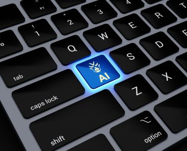 a computer keyboard with a blue light on it