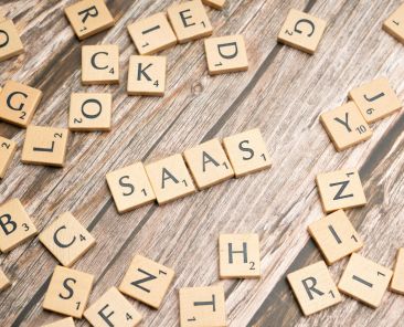 scrabble-letters-spelling-saas-on-a-wooden-tabl