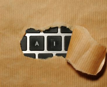 A piece of cardboard with a keyboard appearing through it